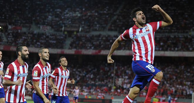 Jumping for joy: Atletico madrid's two-goal hero Diego Costa