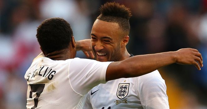 Nathan Redmond: Receives a hug from Raheem Sterling