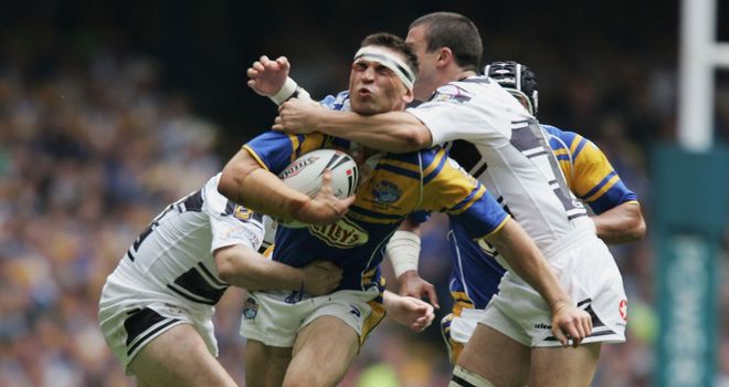Kevin Sinfield is unable to get through a a determined Hull FC defence during the 2005 final, the last time Hull won the trophy
