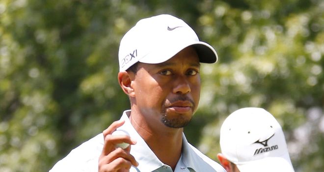 Tiger Woods: Still leads despite indifferent round