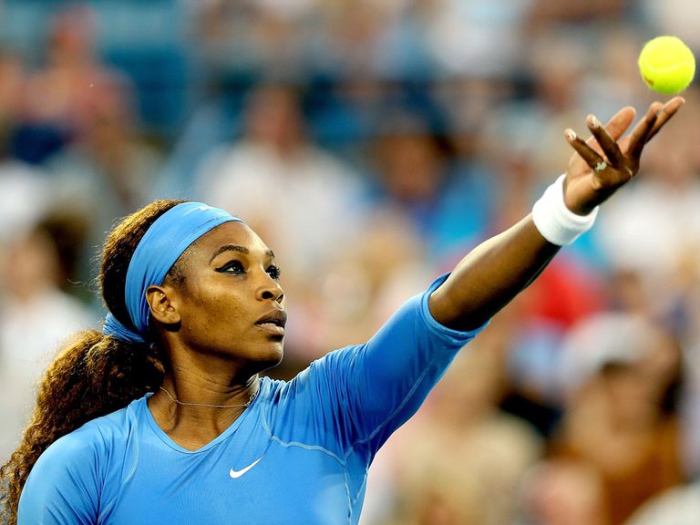 Serena Williams serves en route to victory over Li Na