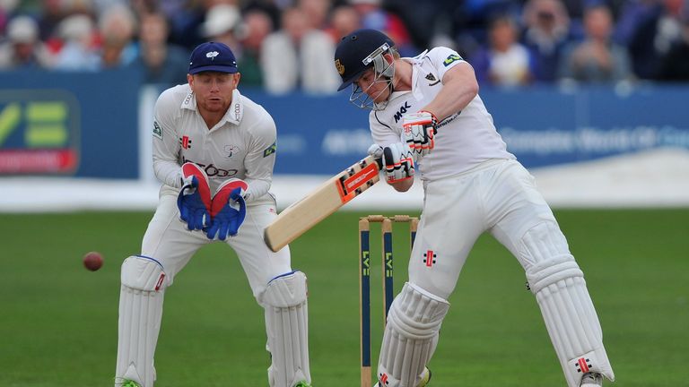 Ben Brown cuts for four as wicketkeeper Jonny Bairstow looks on