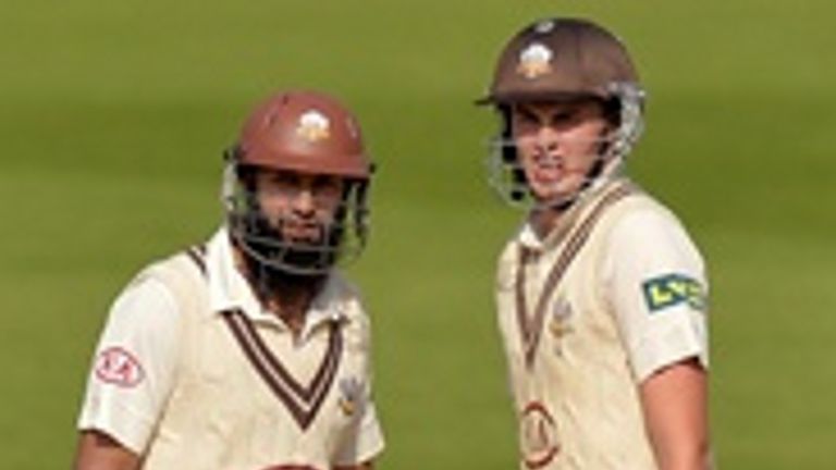 Dominic Sibley (right) with world No 1 Hashim Amla