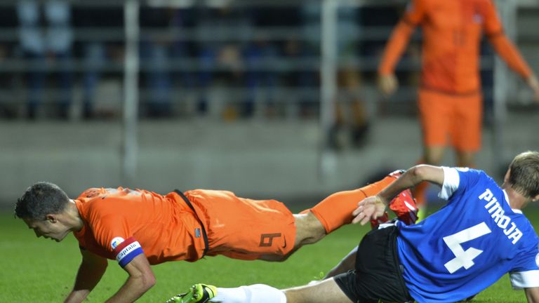 Robin van Persie takes a tumble