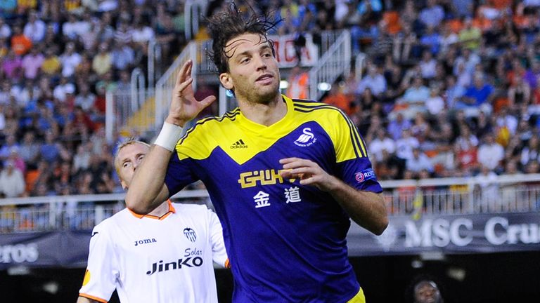 Michu: Celebrates his superb goal against Valencia