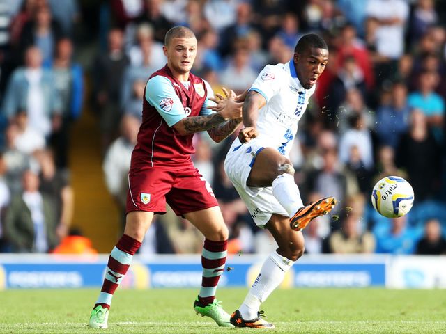 Kieran Trippier watches Dominic Poleon.