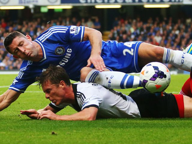 Gary Cahill and Scott Parker tumble.