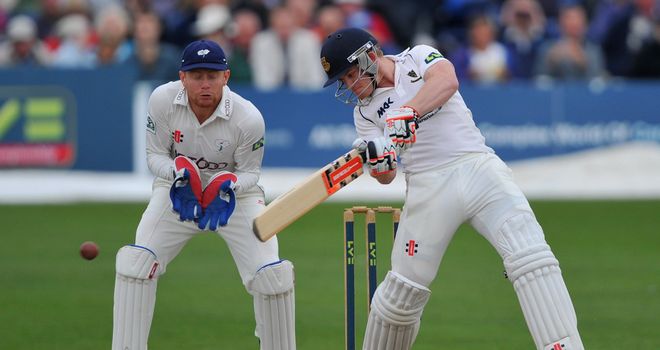 Ben Brown cuts for four as wicketkeeper Jonny Bairstow looks on