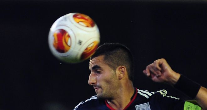 Maxime Gonalons: Lyon's French midfielder heads the ball at Betis