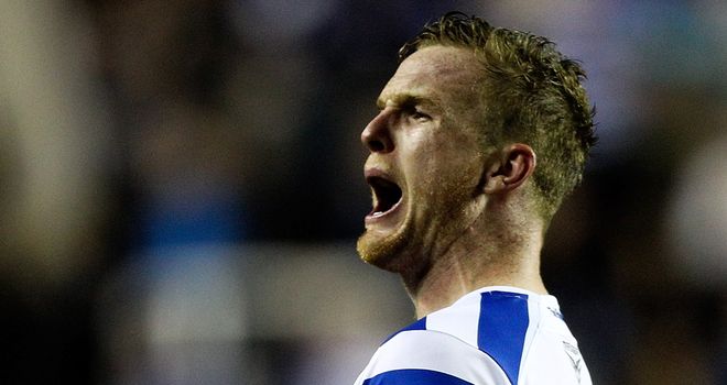 Alex Pearce celebrates victory