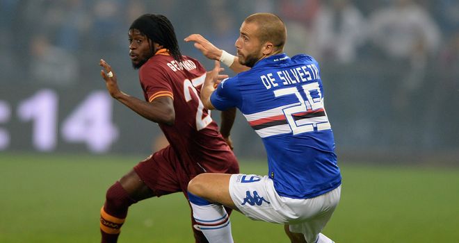 Gervinho tries to escape De Silvestri.