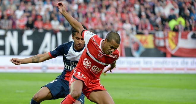 Matthieu Dossevi turns with the ball.