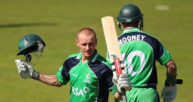 William Porterfield celebrates his century in defeat by England