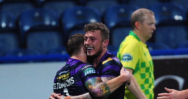 Josh Charnley celebrates scoring against Huddersfield two weeks ago
