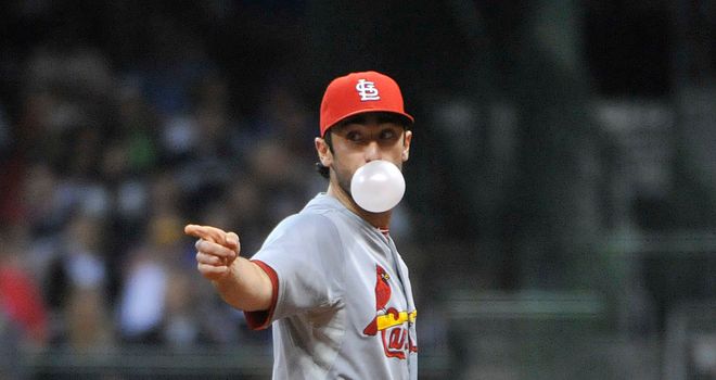St Louis Cardinals second baseman Matt Carpenter multitasks during win against Milwaukee Brewers
