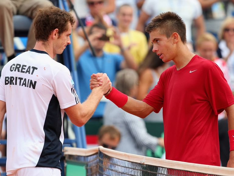 Andy Murray (l): Eased to victory