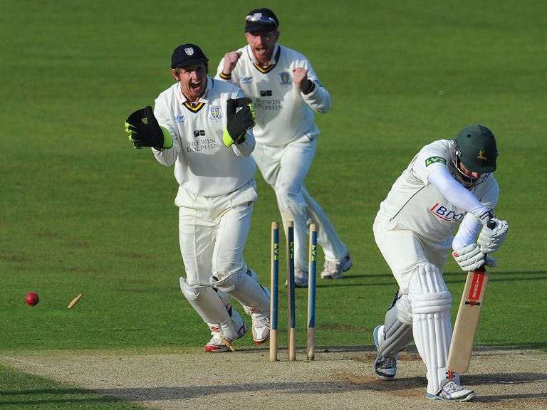 Paul Franks is bowled by Durham's Scott Borthwick