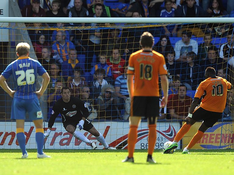 Bakary Sako scores the winner for Wolves at Shrewsbury.