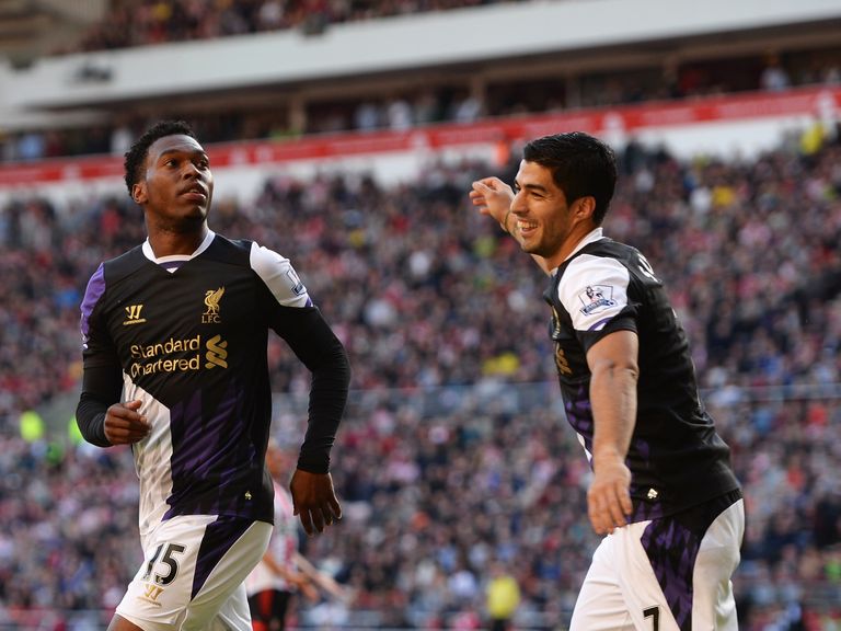 Luis Suarez says he is pleased to be playing with Sturridge