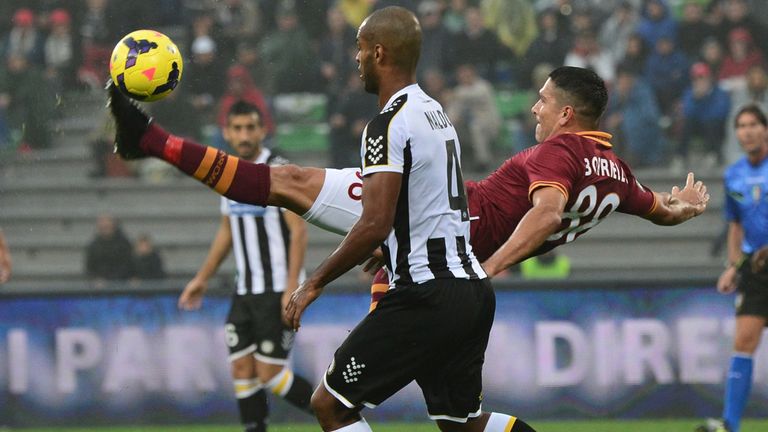 Marco Borriello fights for the ball.