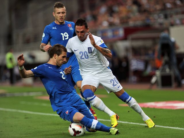 Jose Holebas in action for Greece.