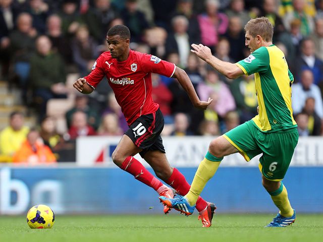 Fraizer Campbell tries to evade Michael Turner.