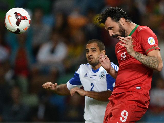 Hugo Almeida wins a header.