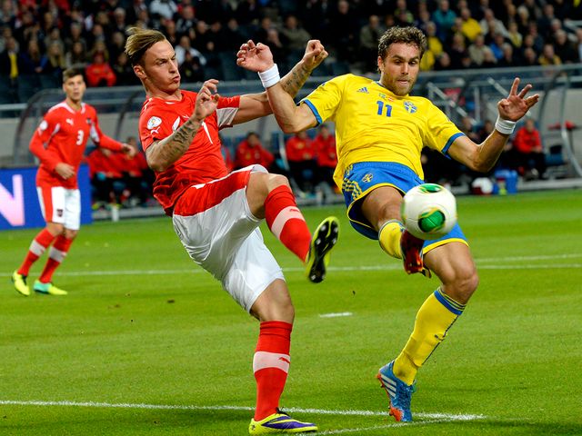 Marko Arnautovic and Johan Elmander tangle.