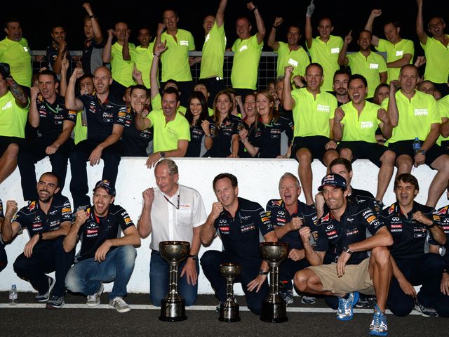 Vettel celebrates with the Red Bull team