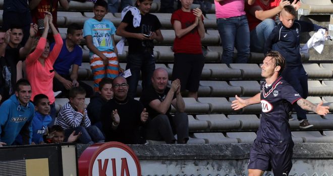 Ludovic Obraniak celebrates.