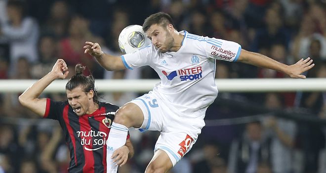 Andre-Pierre Gignac wins a header.