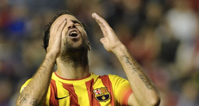 Cesc Fabregas reacts to another missed chance for the visitors