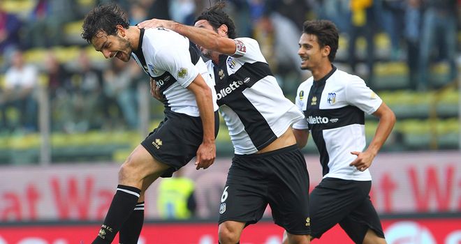 Marco Parolo and Parma celebrate.