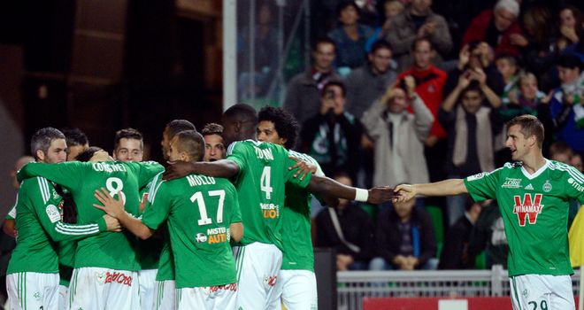 The hosts celebrate a goal