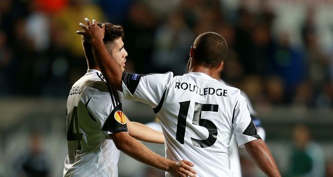 Wayne Routledge: Swansea winger celebrates after scoring the winner