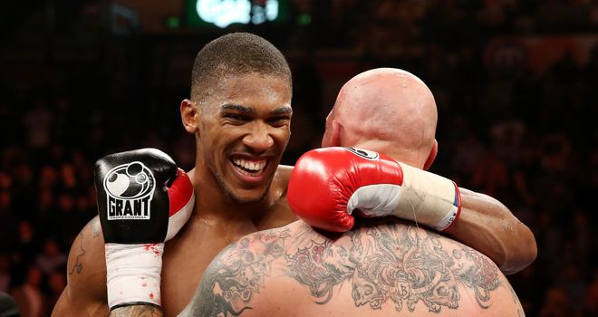 Anthony Joshua shares a word with Paul Butlin after the former's second-round victory