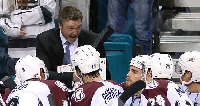 New Colorado Avalanche head coach Patrick Roy talks to his players