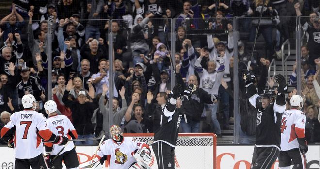 Jeff Carter celebrates his winning goal with Anze Kopitar