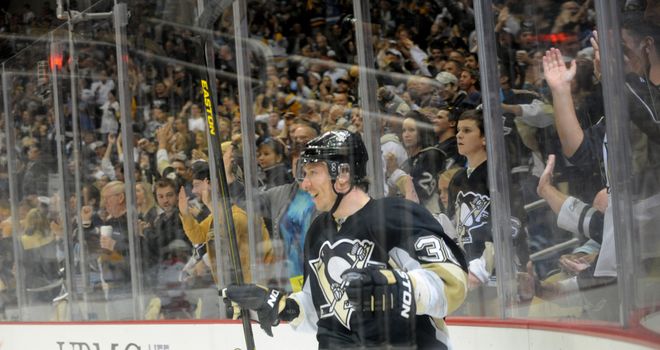 Jussi Jokinen celebrates his hat-trick for Pittsburgh Penguins