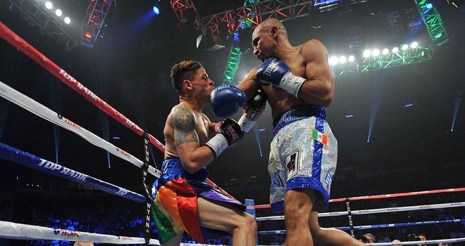 Orlando Cruz (Left): Knocked out in the seventh round of his title fight in Las Vegas