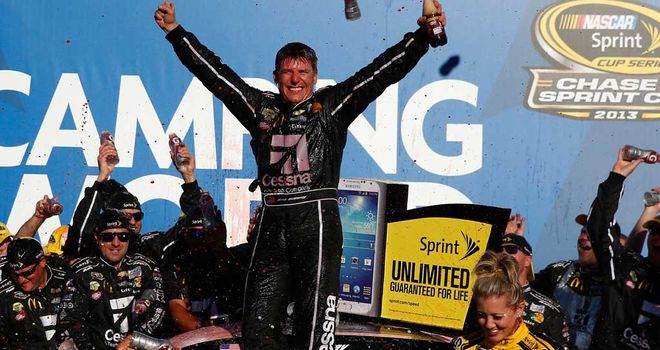 Jamie McMurray celebrates with his team after Talladega win