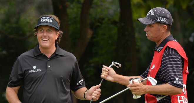 Phil Mickelson with caddie Jim 'Bones' Mackay during the pro-am for the WGC-HSBC Champions