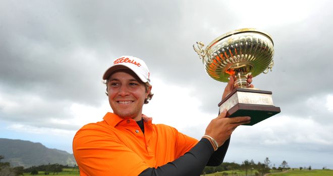 Peter Uihlein poses with the trophy after winning the Madeira Islands Open
