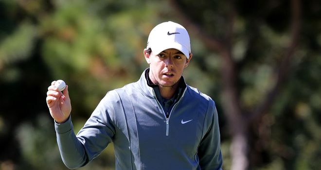 Rory McIlroy of Northern Ireland acknowledges spectators on the eighth green during the second round of the Kolon Korea Open
