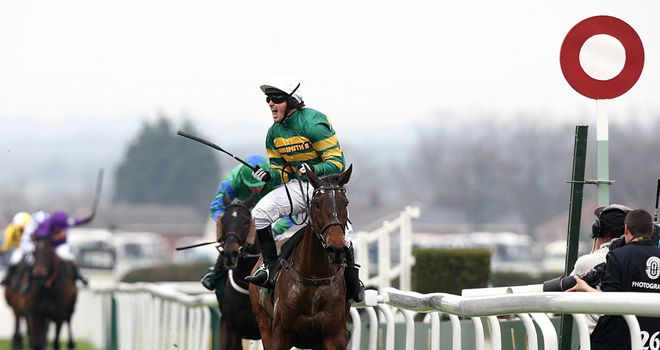 Tony McCoy salutes the crowd after winning the Grand National