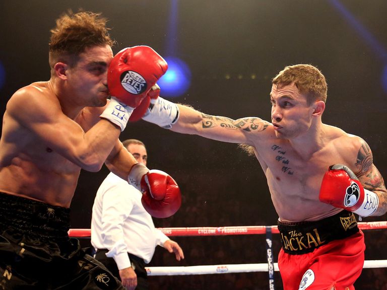 Carl Frampton (r) on the attack against Jeremy Parodi