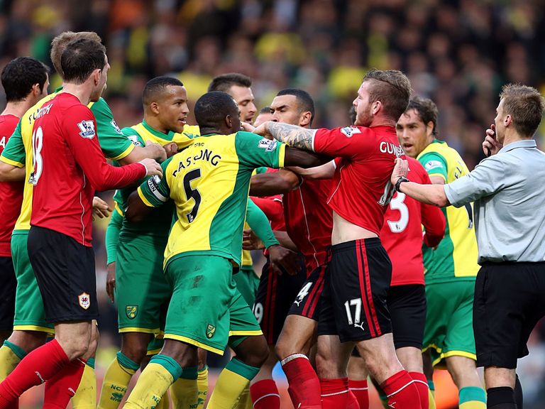 Norwich and Cardiff players clash at Carrow Road