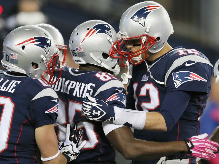 Kenbrell Thompkins and Tom Brady celebrate the match-winning TD