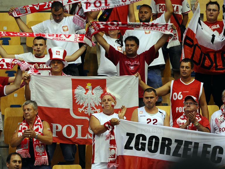 Poland fans standing for the national anthem