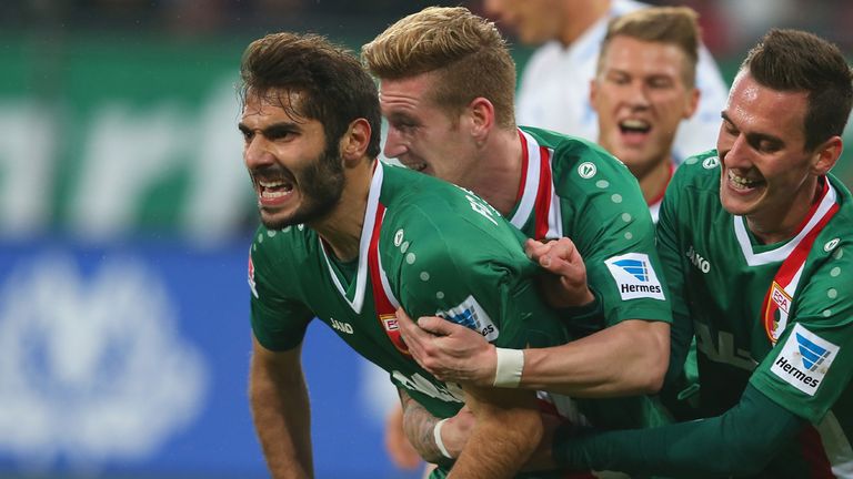 Halil Altintop of Augsburg celebrates after scoring